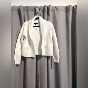 White cardigan sweater. Almost new. Very thick and comfortable.